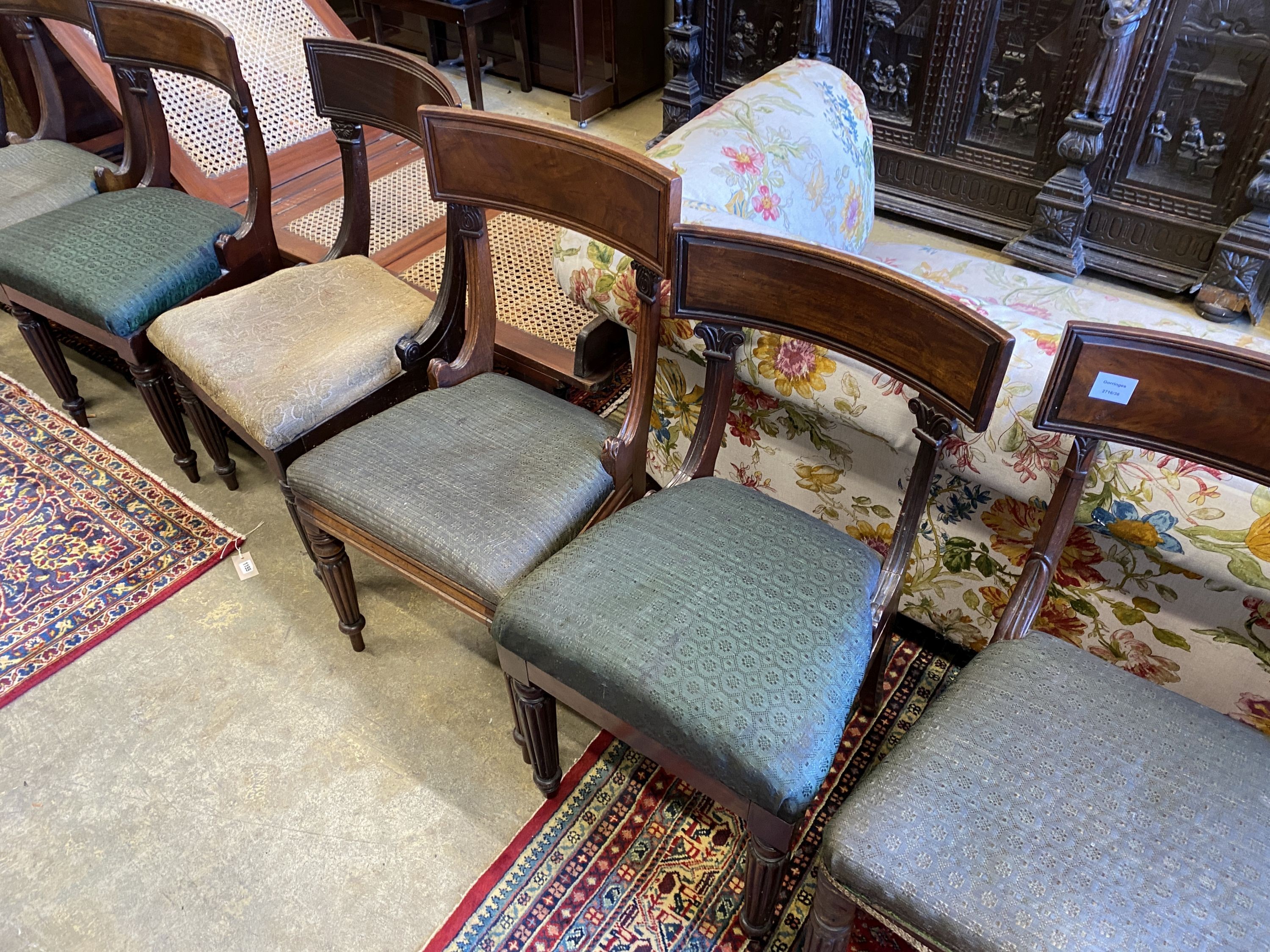 A harlequin set of eight early Victorian mahogany dining chairs